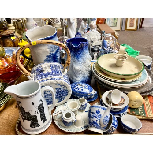 297 - Assortment of blue and white ware, jugs and miniature tea set, plates, candle holder, etc