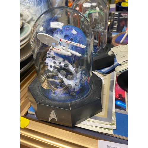 295 - Assorted Star Trek memorabilia including mugs, models, plates, etc. and three glass domed ltd editio... 