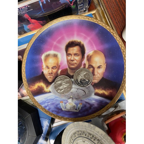 295 - Assorted Star Trek memorabilia including mugs, models, plates, etc. and three glass domed ltd editio... 