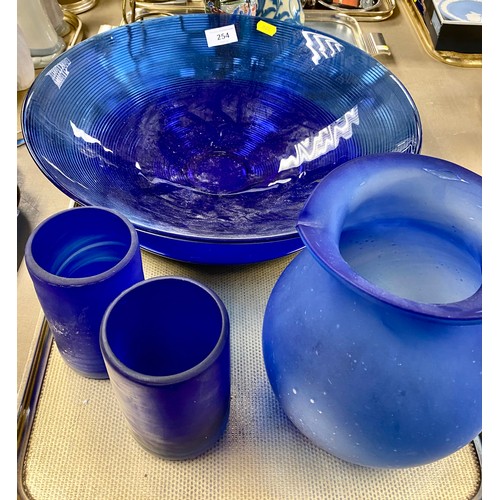 254 - Five pieces of blue glassware.