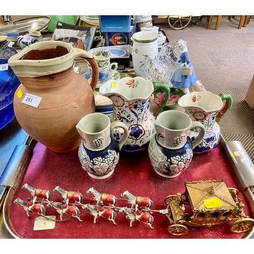 251 - Two West German blue and white relief grape vine jugs, two Allerton Gaudy design graduated jugs, ter... 