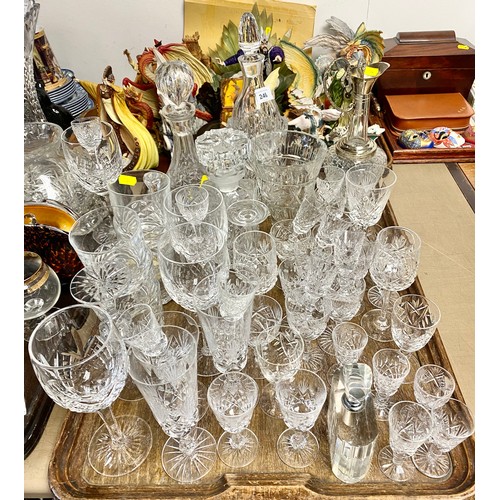 246 - Assortment of cut glass and decanters .