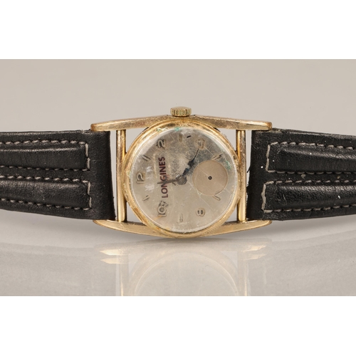 101 - 10ct gold filled Longines watch with leather strap.