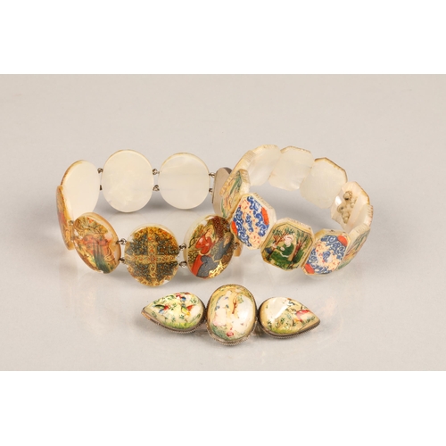 107 - Two antique hand painted Eastern / Persian mother of pearl bracelets, one with white metal clasp, an... 