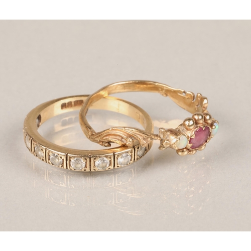 51 - 9ct gold ring set opals and red stone. Size: N/O (with a yellow gold 9ct band).