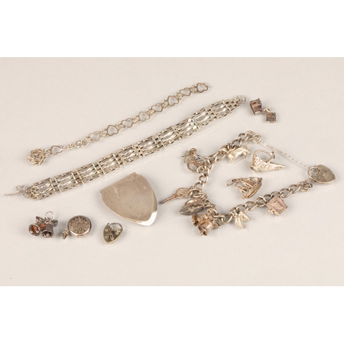 63 - Quantity of silver items including charm bracelet, gate silver bracelet etc.