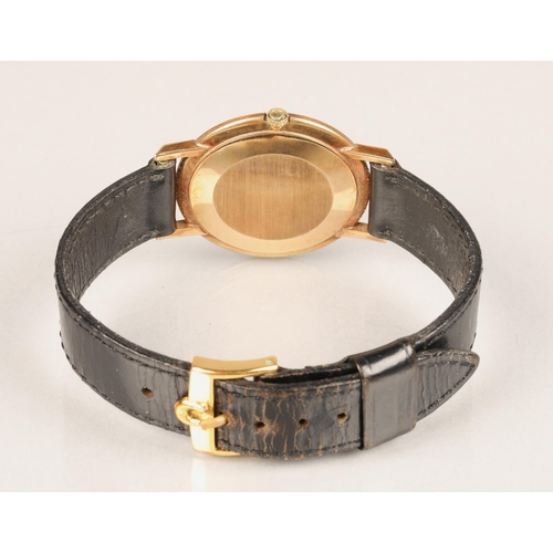 97 - 9ct gold Omega men's watch with leather strap.