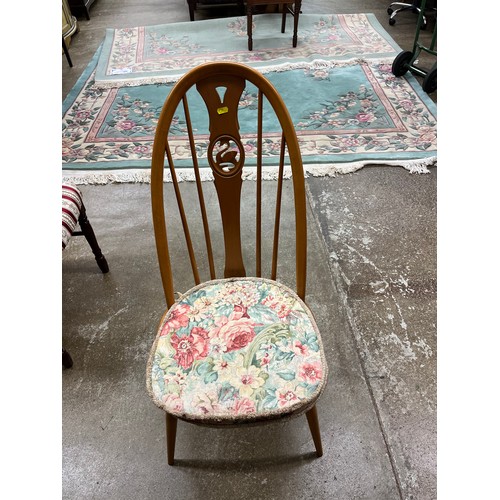 539 - Ercol circular pedestal table with four matching chairs.table diameter 100cm