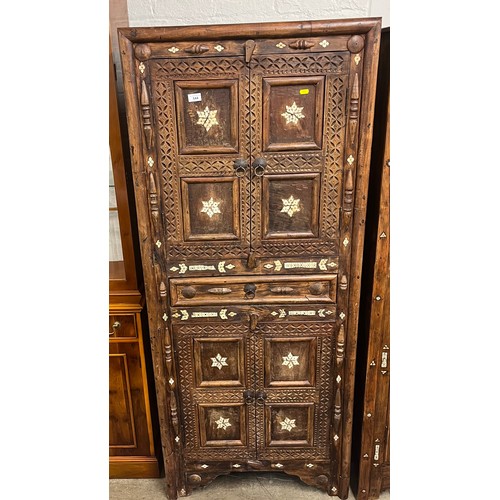 544 - Rustic African bone inlaid cupboard over cupboard178cm high,78cm wide