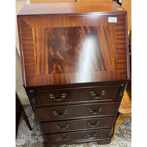 559 - Mahogany writing bureau over four drawers, 95cm h