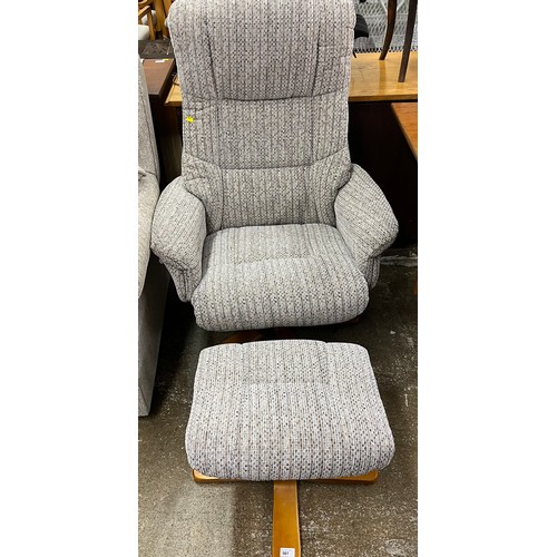 561 - Contemporary arm chair with foot stool