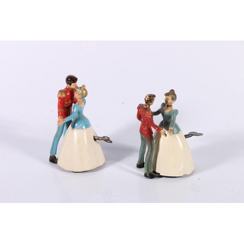 102 - Two clockwork dancing Cinderella toys.  (2)