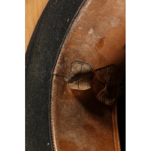 18 - Two black bowler hats and a tin hat box.