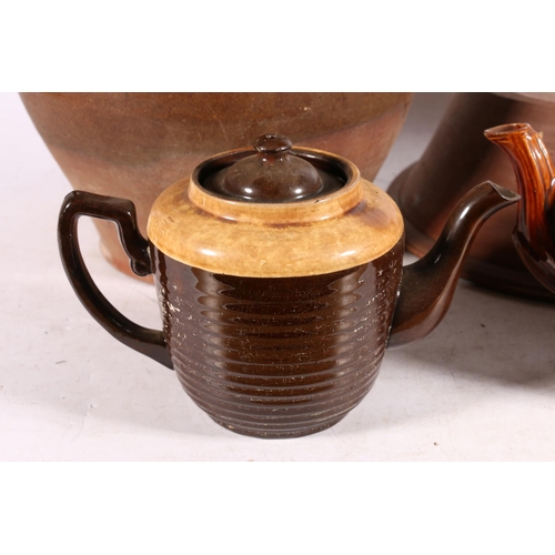 5 - Glazed stoneware storage crock, 30cm high, two treacle glazed teapots, and a vintage mixing bowl.  (... 