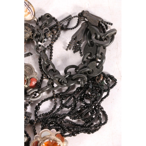 60 - Victorian mourning jewellery, Scottish agate brooches, a coral and sea pearl locket, etc.