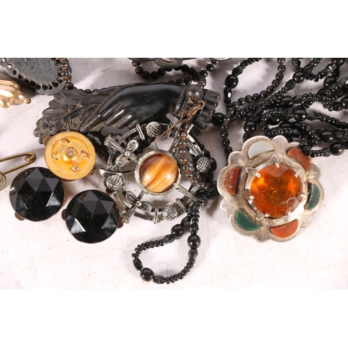 60 - Victorian mourning jewellery, Scottish agate brooches, a coral and sea pearl locket, etc.