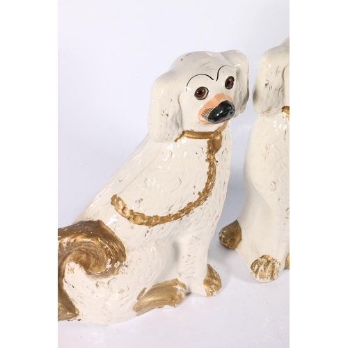 84 - Pair of Staffordshire-style wally dogs, 33cm.