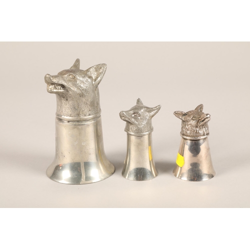 172A - Three silver plated 'fox head' stirrup cups; 12.5cm high