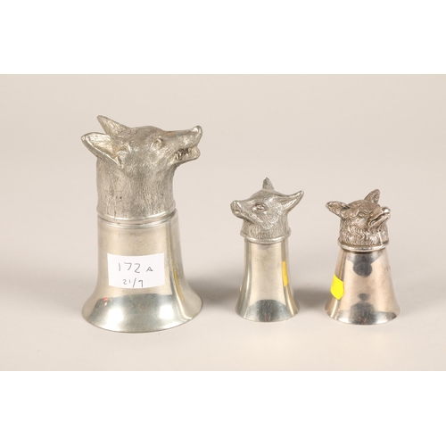 172A - Three silver plated 'fox head' stirrup cups; 12.5cm high