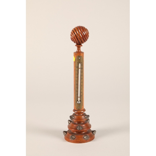 186 - Oak desk top barometer, 28.5 cm