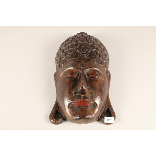 197 - Carved wooden Buddha head wall hanging 