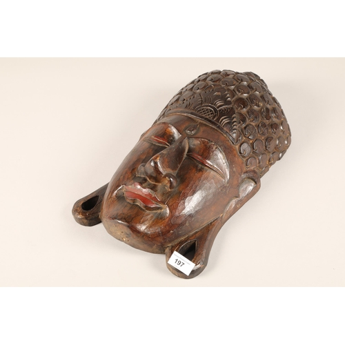 197 - Carved wooden Buddha head wall hanging 