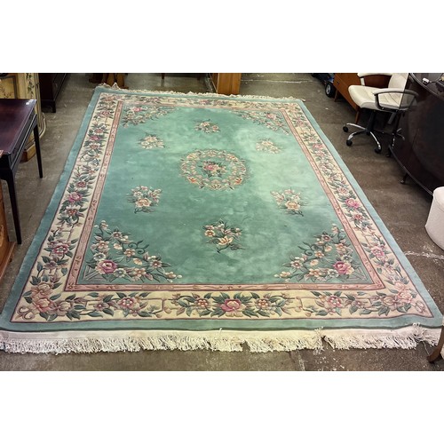 571 - Large green Chinese embossed floral ruglength 390cm, 275 cm wide