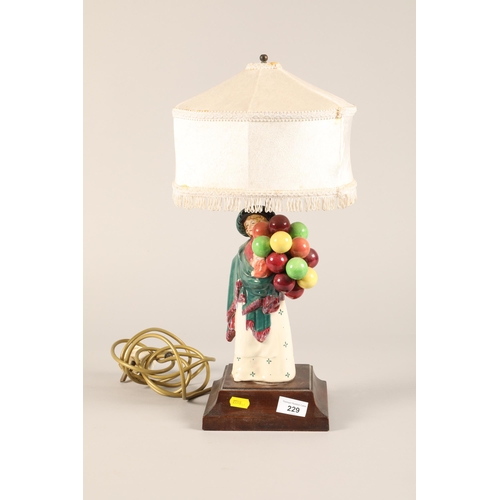 229 - Balloon seller and baby table lamp