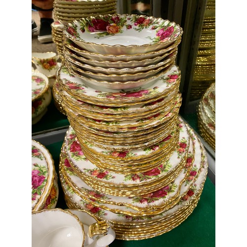 33 - Large quantity of Royal Albert Old country roses, including 12 cups and saucers, coffee pot, tea pot... 