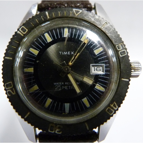 39 - Timex: Water resistant 25 metres divers style wristwatch circa 1970s, stainless case with black beze... 