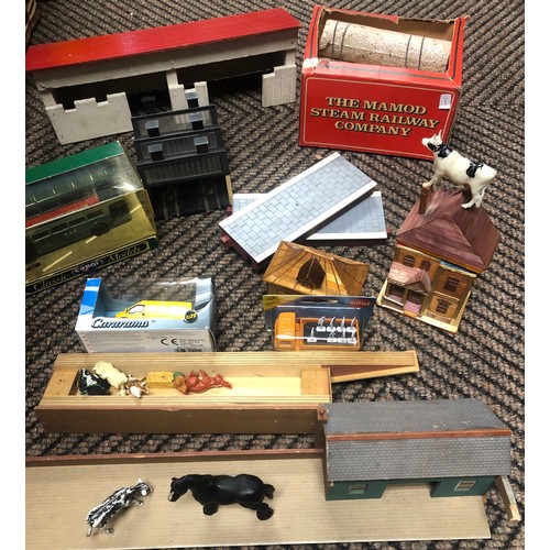 328 - Quantity of toy train set items including farm buildings and animals, Corgi in boxes