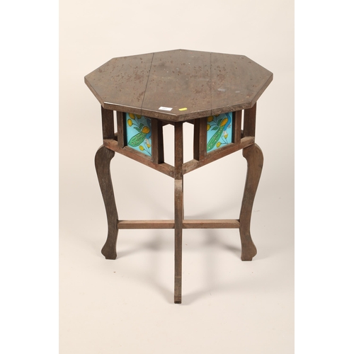 517 - Octagonal occasional table with glass painted panels