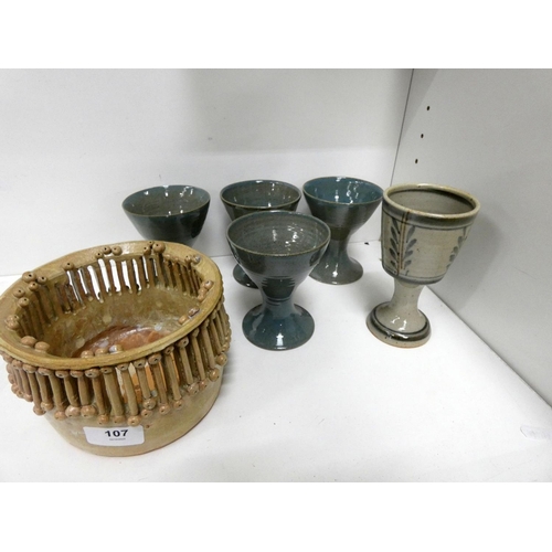 107 - Set of four Studio pottery goblets and another a studio pottery bowl.