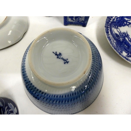 21 - Collection of 19th/20th century blue and white to include bowls, vases etc.