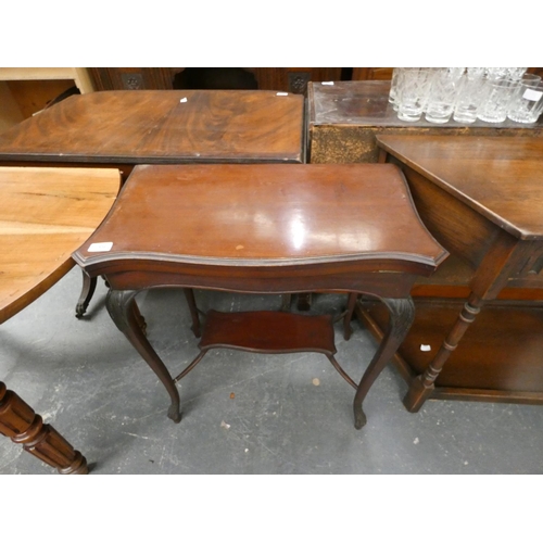 416 - Two tier mahogany fold over card table.