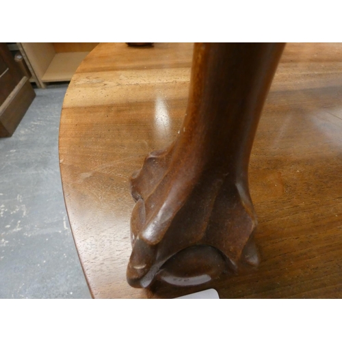 419 - Mahogany glass top coffee table on ball and claw feet.