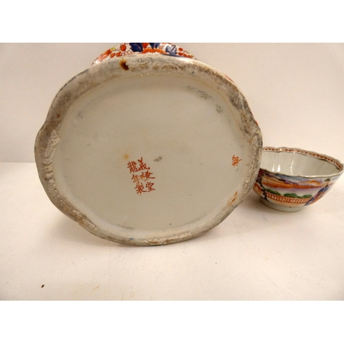 61 - Twin handle Imari style vase with six character marks and a tea bowl.