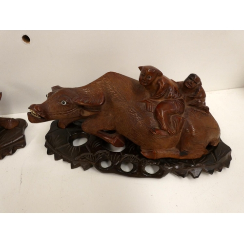 95 - Pair of antique root wood water buffalo figures.