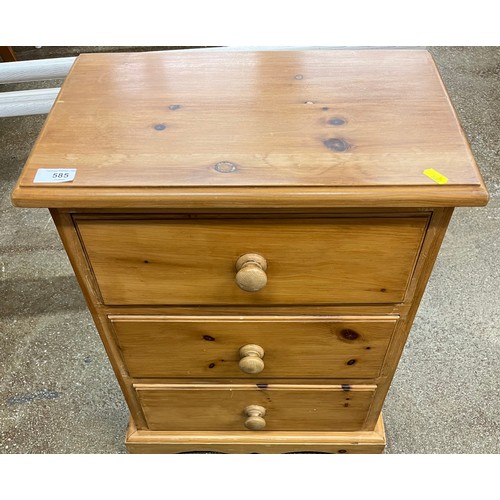 585 - Three drawer pine bedside chest