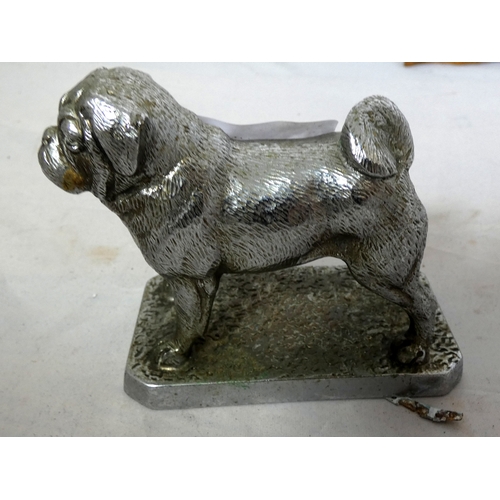 6 - White metal car mascot in the form of a pug (possibly Liberty).