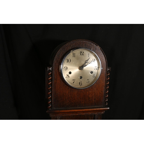 125 - Oak-cased grandmother clock, 140cm tall.