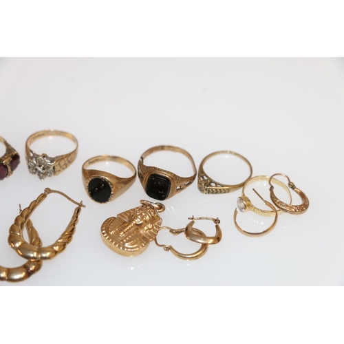 131 - Eight rings, four pairs of earrings, and two charms, all 9ct gold, 24.6g.