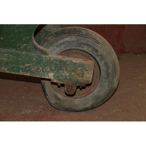 32 - Green-painted wooden wheelbarrow, 160cm long.