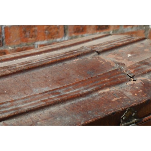 42 - Dome-topped tin trunk.