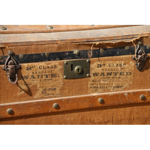 43 - Wood-bound domed-top cabin trunk.