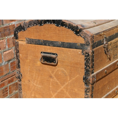 43 - Wood-bound domed-top cabin trunk.