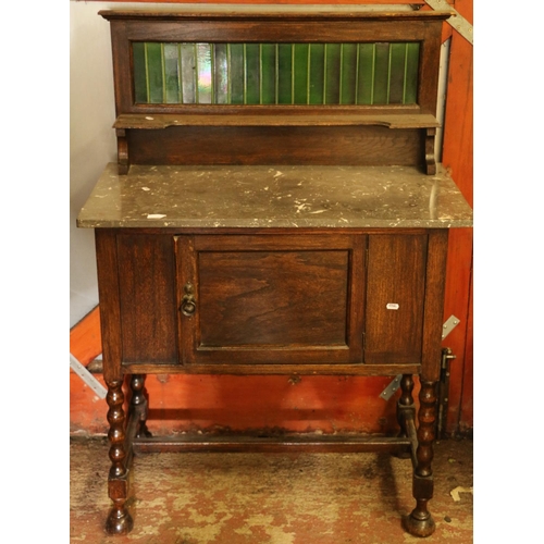 48 - Early 20th century washstand with marble top and tiled back.