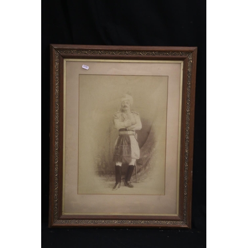 59 - Framed photographic print of an Indian general, 47cm x 35cm.