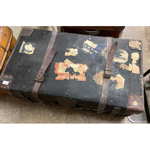 630 - Large vintage suitcase with travel stickers and leather straps and another trunk{2}