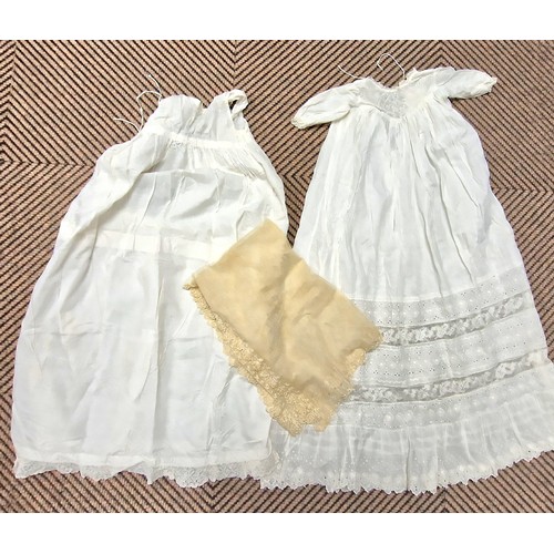 336 - Two children's cotton and lace christening gowns